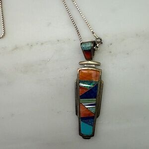 Sterling, coral, turquoise, lapis pendant on a sterling chain.